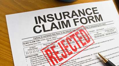 Picture of a rejected insurance claim form. Highlighting the need for experienced Insurance Bad Faith Attorneys in Florida to fight against insurance companies who send claim rejections to consumers who are wrongfully denied coverage.